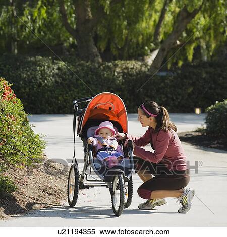 Woman and stroller View Large Photo Image Stock Photography - Woman and stroller. Fotosearch