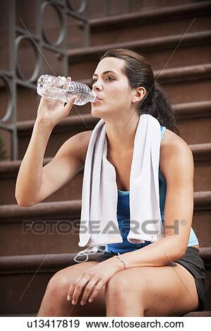 Stock Photo - Woman drinking water. Fotosearch