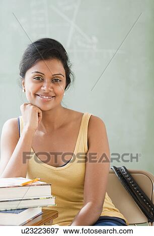 Stock Photo - Woman in classroom. Fotosearch