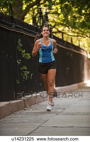 Woman jogging View Large Photo Image Stock Photography - Woman jogging. Fotosearch