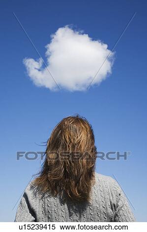 Woman looking at cloud View Large Photo Image Stock Photography - Woman looking at cloud. Fotosearch