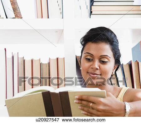 Stock Photo - Woman reading. Fotosearch