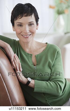 Woman sitting View Large Photo Image Stock Image - Woman sitting. Fotosearch