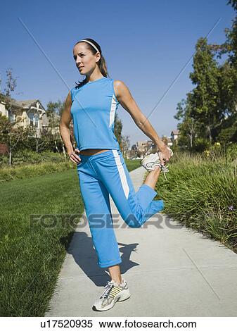 Woman stretching View Large Photo Image Stock Photography - Woman stretching. Fotosearch