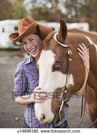 Woman with horse View Large Photo Image Stock Image - Woman with horse. Fotosearch