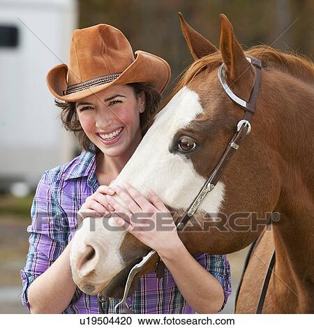 Stock Image - Woman with horse. Fotosearch