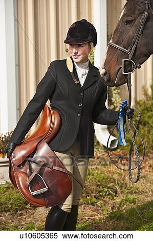 Stock Photography - Woman with horse. Fotosearch