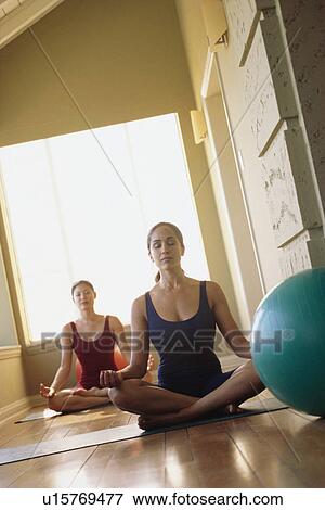 Women meditating View Large Photo Image Stock Photo - Women meditating. Fotosearch