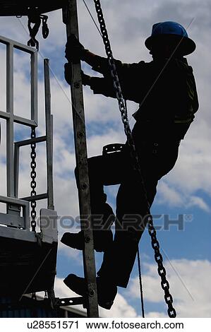 Worker climbing View Large Photo Image Stock Image - Worker climbing. Fotosearch