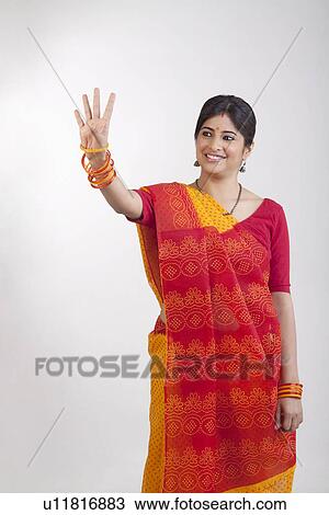A Rajasthani woman waving View Large Photo Image Stock Image - A Rajasthani woman waving. Fotosearch