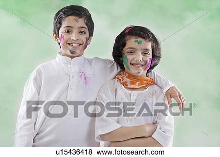 Stock Photo - Boy and girl posing together. Fotosearch