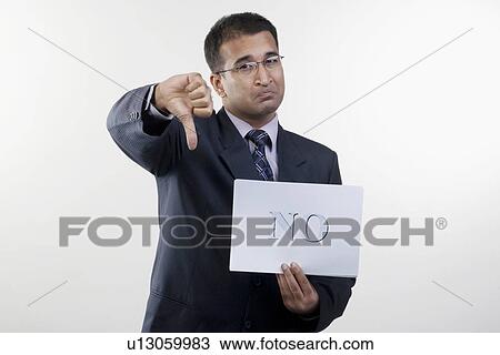 Businessman giving thumbs-down View Large Photo Image Stock Image - Businessman giving thumbs-down. Fotosearch