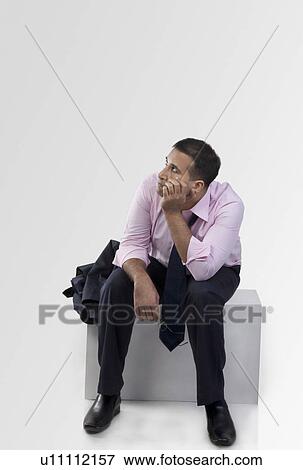Stock Photo - Businessman thinking. Fotosearch