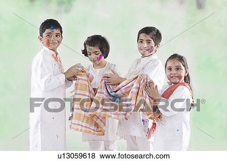 Children wiping their hands on a cloth View Large Photo Image Stock Photo - Children wiping their hands on a cloth. Fotosearch
