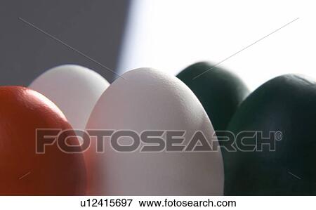Stock Photo - Different coloured eggs. Fotosearch