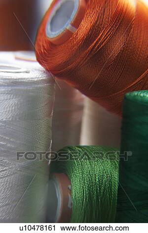 Different coloured spools View Large Photo Image Stock Image - Different coloured spools. Fotosearch