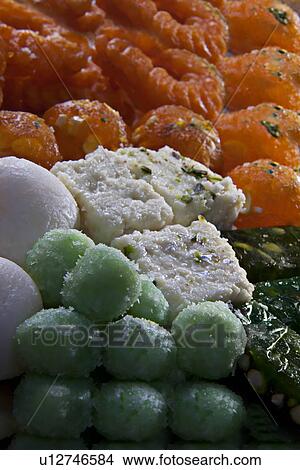 Picture - Different coloured sweets. Fotosearch