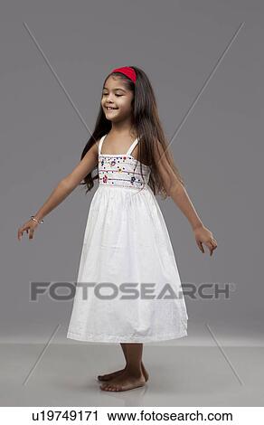 Girl enjoying herself View Large Photo Image Stock Image - Girl enjoying herself. Fotosearch