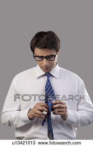 Man getting ready for office View Large Photo Image Stock Image - Man getting ready for office. Fotosearch
