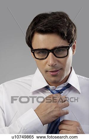 Stock Photography - Man getting ready for office. Fotosearch