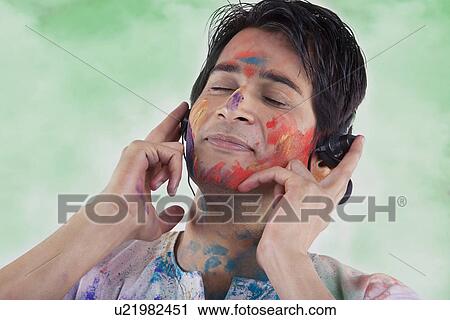Man listening to music View Large Photo Image Stock Image - Man listening to music. Fotosearch