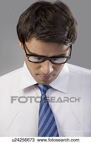 Man looking down View Large Photo Image Stock Image - Man looking down. Fotosearch