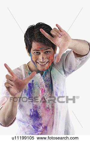 Stock Photography - Man making framed gesture with his hands. Fotosearch