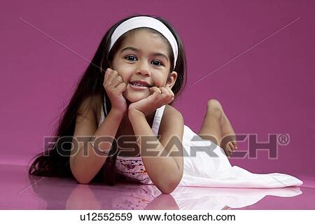 Stock Photo - Portrait of a girl. Fotosearch