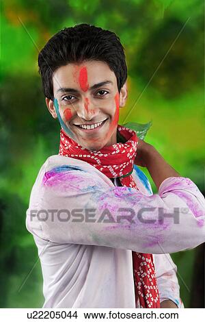 Portrait of a man with colour on his face View Large Photo Image Picture - Portrait of a man with colour on his face. Fotosearch