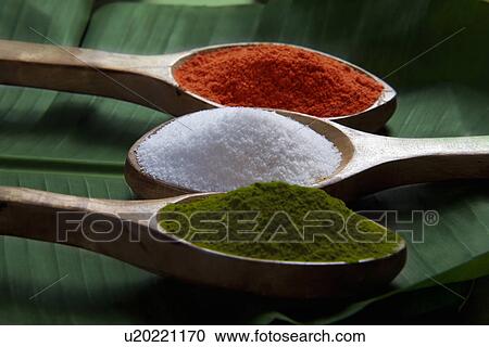 Spices in wooden spoons View Large Photo Image Stock Image - Spices in wooden spoons. Fotosearch