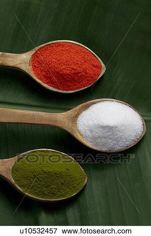 Spices in wooden spoons View Large Photo Image Stock Photo - Spices in wooden spoons. Fotosearch