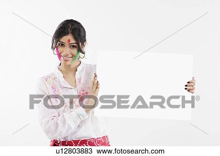 Woman holding a placard View Large Photo Image Stock Image - Woman holding a placard. Fotosearch