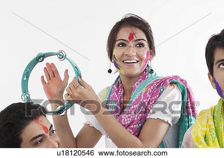 Stock Photograph - Woman with a tambourine. Fotosearch
