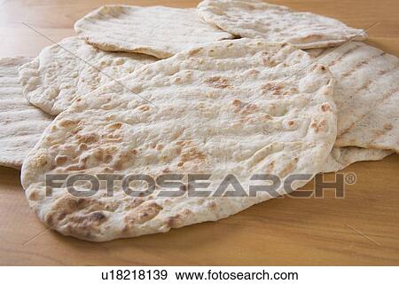 baked pita bread View Large Photo Image Stock Photo - baked pita bread. Fotosearch