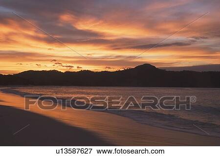 beach at sunset, republic of costa rica View Large Photo Image Stock Photo - beach at sunset, republic of costa rica. Fotosearch