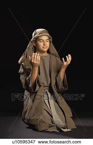 Stock Photo - boy portraying a young jesus. Fotosearch