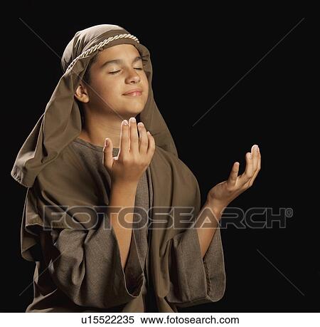 Stock Photography - boy portraying a young jesus. Fotosearch