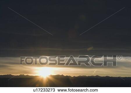 Chinook clouds and sunset over mountains, Alberta, Canada View Large Photo Image Stock Image - Chinook clouds and sunset over mountains, Alberta, Canada. Fotosearch