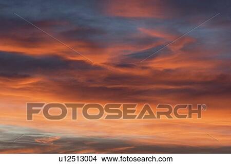 Picture - Colorful chinook clouds at sunset, Calgary, Alberta, Canada. Fotosearch