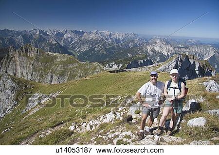 Couple hiking trail on Centennial Ridge, Kananaskis Country, Alberta, Canada View Large Photo Image Stock Photo - Couple hiking trail on Centennial Ridge, Kananaskis Country, Alberta, Canada. Fotosearch