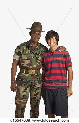 fort lauderdale, florida, united states of america; a military man with his arm around a teenage boy View Large Photo Image Stock Photo - fort lauderdale, florida, united states of america; a military man with his arm around a teenage boy. Fotosearch