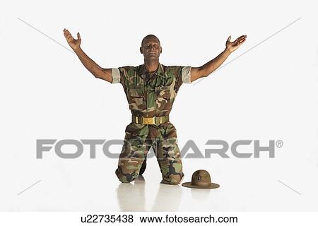 fort lauderdale, florida, united states of america; a military man with arms raised and eyes closed View Large Photo Image Stock Photo - fort lauderdale, florida, united states of america; a military man with arms raised and eyes closed. Fotosearch