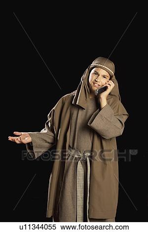 jesus using a cellphone View Large Photo Image Stock Photography - jesus using a cellphone. Fotosearch