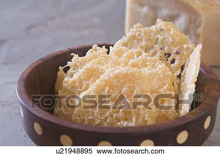 parmesan cheese laces in wooden bowl View Large Photo Image Stock Photography - parmesan cheese laces in wooden bowl. Fotosearch