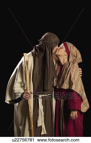 Stock Image - people dressed as mary and joseph. Fotosearch