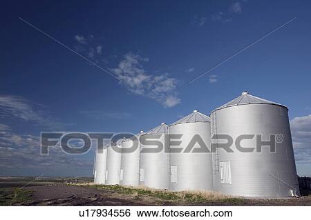 Stock Photograph - Row of metal silos. Fotosearch