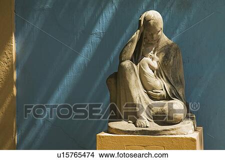 stone statue of the virgin mary holding jesus, buenos aires, argentina View Large Photo Image Picture - stone statue of the virgin mary holding jesus, buenos aires, argentina. Fotosearch