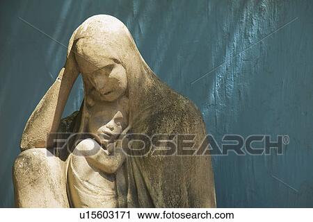 stone statue of the virgin mary holding jesus, buenos aires, argentina View Large Photo Image Stock Image - stone statue of the virgin mary holding jesus, buenos aires, argentina. Fotosearch