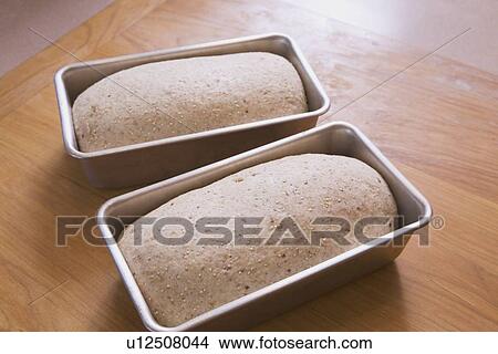 two unbaked loaves of bread View Large Photo Image Picture - two unbaked loaves of bread. Fotosearch