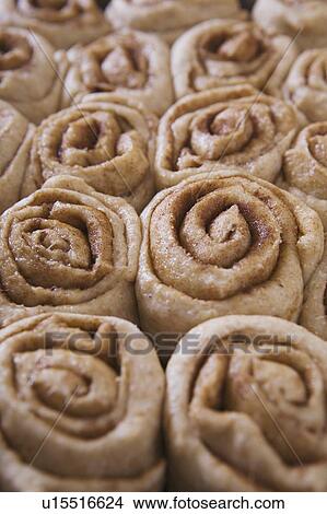 Picture - unbaked cinnamon buns. Fotosearch